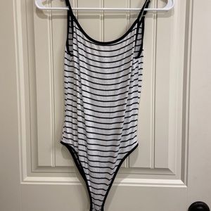 Black and white striped body suit